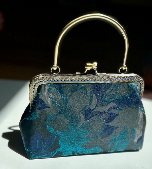 Clutch ÉCHAPPÉE